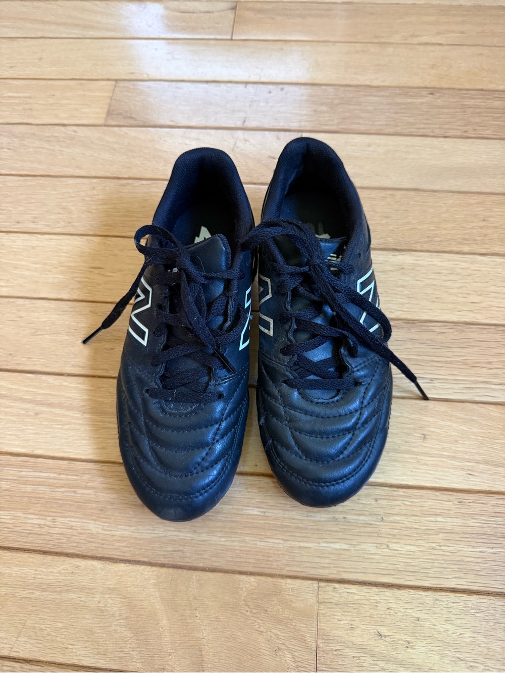 Kids New Balance Black Soccer Cleats, kids size 1.5